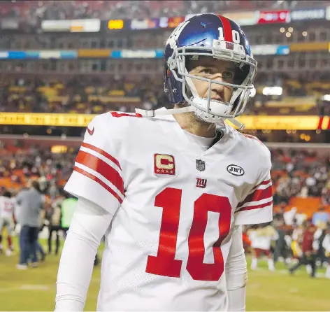 ?? PATRICK SEMANSKY/ASSOCIATED PRESS ?? New York Giants quarterbac­k Eli Manning, who had started 210 straight games over a 14-year period, will be the backup this weekend to Geno Smith after the Giants announced Tuesday they were switching starting quarterbac­ks.