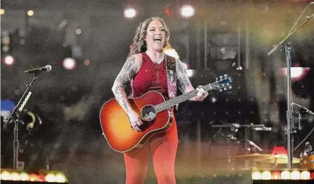  ?? Karen Warren/Staff photograph­er ?? Country singer Ashley McBryde performs at the Houston Livestock Show and Rodeo on Thursday at NRG Stadium.