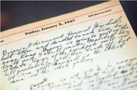  ?? RICK BOWMER/AP FILE ?? A portion of a page from a Harry Truman’s 1947 presidenti­al diary is seen at the National Archives in Washington. Presidents from George Washington to Joe Biden have kept presidenti­al diaries in which they may spill secrets they shouldn’t.