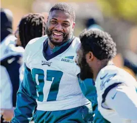  ?? Matt York/Associated Press ?? Eagles defensive tackle Javon Hargrave (97) laughs during a practice on Friday in Tempe, Ariz.