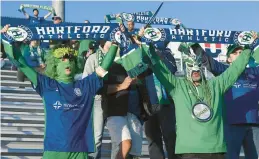  ?? JESSICA HILL/SPECIAL TO THE COURANT ?? The Hartford Athletic has built a fan base, and now the franchise’s new management looks to give them a winner to cheer for.