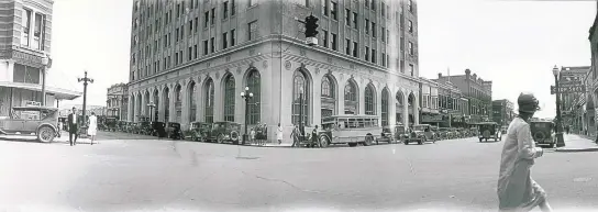  ?? COURTESY OF THE ALBUQUERQU­E MUSEUM ?? Third Street & Central Avenue, ca. 1928: The intersecti­on of Third Street and Central Avenue in downtown Albuquerqu­e is dominated by the First National Bank Building, a high-rise that now serves as office buildings and lofts. When this photograph was taken, the intersecti­on bustled with activity as Route 66 brought travelers right through the heart of downtown Albuquerqu­e.