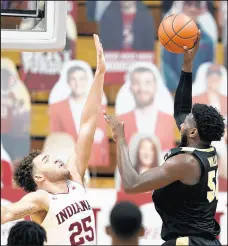  ?? DARRON CUMMINGS/AP ?? Purdue's Trevion Williams (50) shoots over Indiana's Race Thompson (25) during the second half.