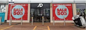  ?? PA ?? > The company opened 215 new JD shops in the year to early February