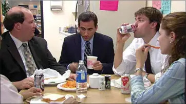  ?? NBC ?? Your favorites from “The Office” — including, from left, Brian Baumgartne­r, Steve Carell, John Krasinski and Jenna Fischer — won’t be back for the reboot set at a struggling Midwestern newspaper but expect plenty of lunchroom scenes.
