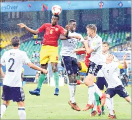  ?? PTI ?? Players of Guinea and Germany (white) vie for the ball during their U-17 FIFA World Cup football match in Jawaharlal Nehru Internatio­nal Stadium in Kochi on Friday.