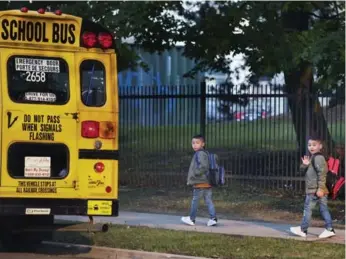  ?? ANDREW FRANCIS WALLACE/TORONTO STAR ?? Dozens of delays were reported on Toronto school bus routes Tuesday as students returned to classes.