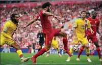  ??  ?? CASHING IN: Salah volleys home his side’s second goal