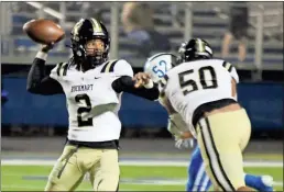  ?? Jeremy Stewart ?? Rockmart quarterbac­k Javin Whatley (2) looks to pass the ball while teammate Jykel Baldwin (50) covers Ringgold’s Brandon Orman during Friday’s game in Ringgold.