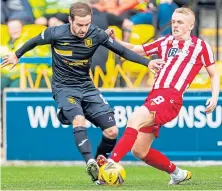  ?? ?? Saints’ Stevie May, top, and Cammy MacPherson put in a battling display at the Tony Macaroni Arena.