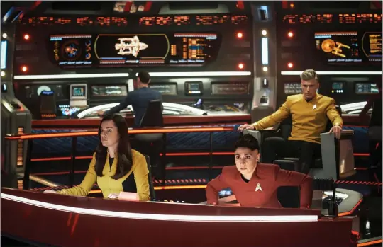  ?? PHOTOS BY MARNI GROSSMAN ?? The bridge crew of “Star Trek: Strange New Worlds” includes, from left, Una (Rebecca Romijn), Spock (Ethan Peck), Ortegas (Melissa Navia) and Pike (Anson Mount).