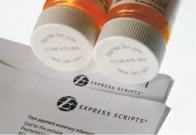  ?? Wilfredo Lee / Associated Press 2017 ?? Cigna’s acquisitio­n of Express Scripts is the latest in a string of proposed buyouts and tie-ups in a rapidly shifting landscape for the health services industry.