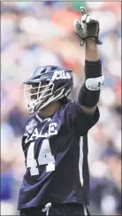  ?? Maddie Meyer / Getty Images ?? TOP: Members of the Yale men’s lacrosse team celebrate after beating Albany 20-11 in an NCAA tournament national semifinal on Saturday in Foxborough, Mass. BOTTOM RIGHT: Yale’s Matt Gaudet celebrates after scoring a goal. BOTTOM LEFT: Albany’s Tehoka Nanticoke reacts after Saturday’s loss.