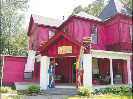  ?? Special to the Democrat-Gazette/ KIM DISHONGH ?? The house that John Schenk (left) and Robert Loyd turned into the Pink House is a Conway institutio­n. A GoFundMe campaign aims to keep the couple’s legacy of inclusion alive.