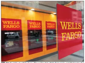  ?? (AP) ?? ATMs line the lobby of a Wells Fargo office in New York. Wells Fargo & Co. said Wednesday that its first-quarter net profit jumped to $4.74 billion from a year earlier.