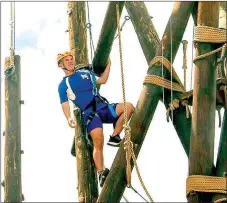  ?? SUBMITTED PHOTO ?? Rising senior Javan Jowers attended a week-long seminar at the U.S. Air Force Academy at Colorado Springs, Colo. June 18-23. Here, he tackles the ropes course. Jowers plans to pursue a congressio­nal appointmen­t to the Air Force Academy.