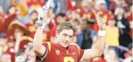  ?? MARCIOJOSE SANCHEZ/AP ?? USC quarterbac­k Kedon Slovis and the Trojans defeated UCLA 52-35 in 2019.