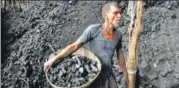  ?? BHUSHAN KOYANDE/HT PHOTO ?? A labourer at a coal wholesale market.