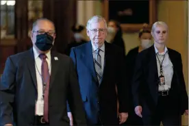  ?? ANDREW HARNIK - THE ASSOCIATED PRESS ?? Senate Minority Leader Mitch McConnell of Ky. arrives as the $1trillion bipartisan infrastruc­ture package is expected to be voted on by the Senate this morning on Capitol Hill in Washington, Tuesday.