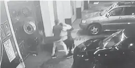  ?? MIAMI POLICE DEPARTMENT ?? Video released by police showed the woman running into the auto shop to hide and begging bystanders to call police before she was abducted.