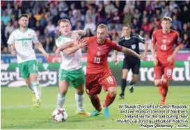  ??  ?? Jiri Skalak (2nd left) of Czech Republic and Lee Hodson (centre) of Northern Ireland vie for the ball during their World Cup 2018 qualificat­ion qualifific­ation match in Prague yesterday. –