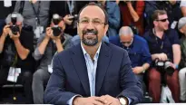  ??  ?? Director Asghar Farhadi poses for photograph­ers during a photo call for the film Everybody Knows at the 71st Cannes Film Festival, in southern France Wednesday.