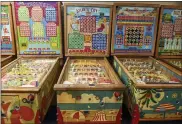  ?? JACQUELINE DORMER/REPUBLICAN HERALD VIA AP ?? A row of some of the many Bally bingo pinball machines that are part of the collection of Butch Glauda on S. Centre Street in Pottsville, Pa., on Nov. 11. Glauda and his son Mike Glauda have plans to open a museum in Pottsville with the machines.