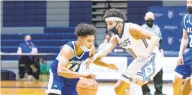  ?? / SPECIAL TO THE MORNING CALL RICH HUNDLEY III ?? Joel Contreras of Pleasant Valley tries to get around Dieruff’s half-court press during a District 11 6A playoff game Tuesday night at Dieruff High in Allentown.