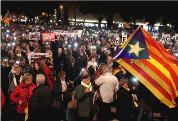 ??  ?? People protest against the Supreme Court at Catalunya Square in Barcelona, Spain. — Reuters photo