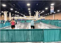  ?? AUSTEN ERBLAT/SOUTH FLORIDA SUN SENTINEL/TNS ?? About 1,500 pickleball players, all 50 years old and older, are competing this week in a national senior championsh­ip tournament in Fort Lauderdale.