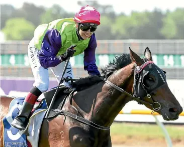  ?? GETTY IMAGES ?? Sam Spratt rides Gobstopper to victory in the 154th running of the New Zealand Cup.