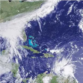  ?? NOAA ?? A satellite image from June 20 shows Tropical Storm Bret on the right and a system that became Tropical Storm Cindy. Of this year’s four storms, only Cindy has hit the U.S.