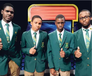  ??  ?? The men from Monk Street took time to pose for our camera before their match against Munro College. St Jago won 33 to Munro’s 26 points. From left: Chanare Lindsay, Joel Henriques , Donald Robinson and team captain David Gayle.