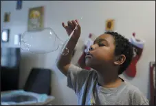  ?? DARRON CUMMINGS — THE ASSOCIATED PRESS ?? Natasha Virgil said her family’s ability to participat­e in activities outside their home markedly improved once 6-year-old Elijah Hill, above, began ABA therapy.