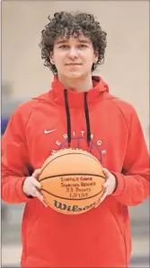  ?? Danielle Pickett, General Photograph­y ?? record-setter: Heritage sophomore Kaleb Gallman was recognized last week for his program- record 33-point performanc­e in a 74-40 win over Cedartown on Jan. 27.