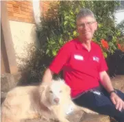  ??  ?? BRINGING JOY: Mark Copland with Jasper, the wheaten border collie.