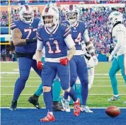  ?? Jeffrey T. Barnes/Associated Press ?? Buffalo Bills wide receiver Cole Beasley celebrates his touchdown during the second half of an NFL wild-card playoff game against the Miami Dolphins on Jan. 15 in Orchard Park, N.Y.