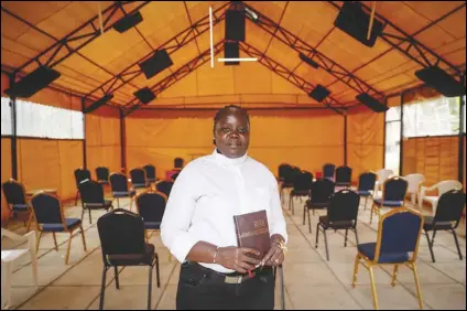  ?? ASSOCIATED PRESS ?? Associate Pastor Caroline Omolo leads the Cosmopolit­an Affirming Community church in Nairobi, Kenya, which serves a predominan­tly LGBTQ congregati­on. “They have always organized a group to maybe silence us or make the church disappear,” Omolo says. “They don’t want it to appear anywhere.”