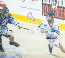  ?? BOB TYMCZYSZYN/POSTMEDIA NETWORK ?? St. Catharines Athletics attack Carter Zavitz, No. 2, shown in action against the Mimico Mountainee­rs in this June 2016 file photo, is back for a second season with the junior A lacrosse season. The Athletics host the Peterborou­gh Lakers in tonight's...