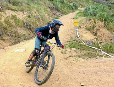  ??  ?? In just her second competitiv­e event, Nelson’s Awen Lloyd won the overall under-14 girls’ category at last week’s South Island schools MTB event in Otago.
