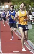  ?? PETE BANNAN — MEDIANEWS GROUP ?? Unionville’s Ethan McIntyre takes the 1,600 with a winning time of 4:19.20on Wednesday.