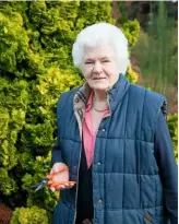  ??  ?? Mary Bowerman, who has taken the baton from her in-laws in developing the heather-filled garden at Champs Hill.