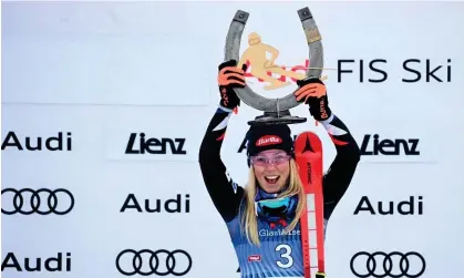  ?? Photograph: Vladimír Šimíček/AFP/Getty Images ?? Mikaela Shiffrin celebrates on the podium on Thursday after winning the women’s giant slalom at Lienz, Austria.