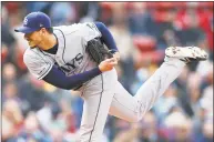  ?? Michael Dwyer / Associated Press ?? The Rays’ Charlie Morton, a Barlow High graduate, pitches during the first inning against the Red Sox on Saturday in Boston.