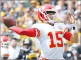  ?? Associated Press photo ?? Kansas City Chiefs quarterbac­k Patrick Mahomes plays in the first quarter of an NFL football game against the Pittsburgh Steelers, Sunday in Pittsburgh.