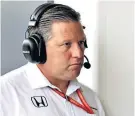  ??  ?? Troubled: Mclaren executive director Zak Brown watches on in the garage