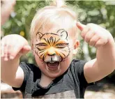  ??  ?? Georgia Smith, 2, was painted as a tiger.