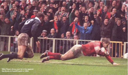  ??  ?? Mike Rayer dives over for a try against the Scots in Cardiff back in 1994.