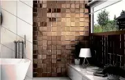  ??  ?? The 3D Pattern range in Oro from Tile Trends simultaneo­usly provides a metallic and textural look.