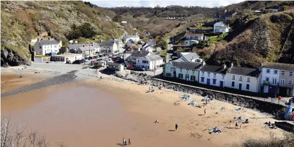  ?? GAYLE MARSH ?? The car park in the middle of Llangranno­g village is still a talking point for residents and visitors